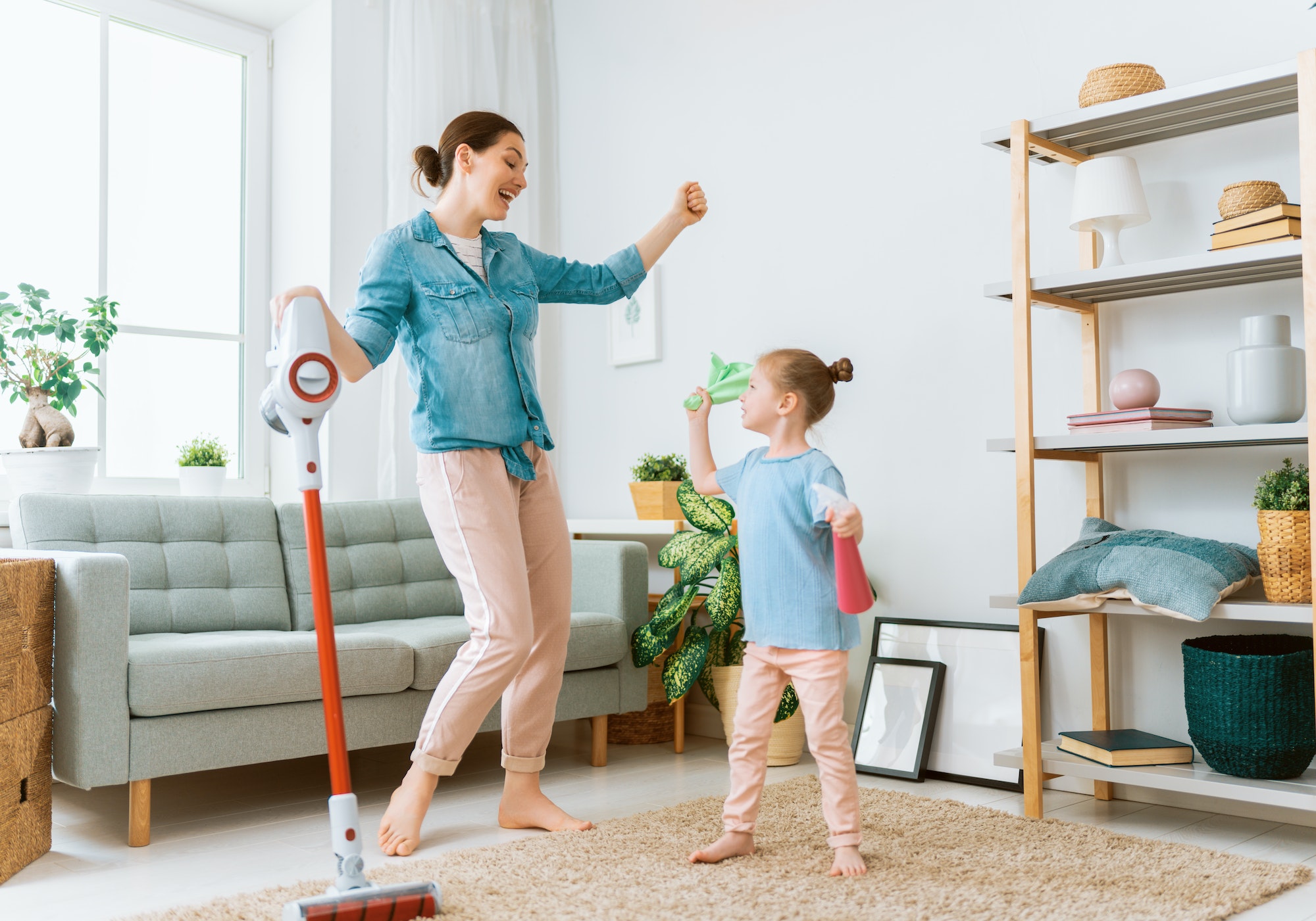 family cleaning the room
